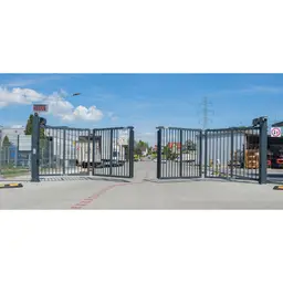 Poartă industrială bi-fold V-King – zonă industrială cu camioane